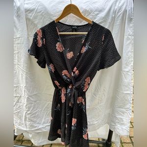 Black dress with pink flowers and V cut design